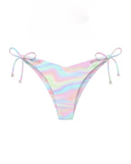 Pastel rainbow striped bikini bottom with tie sides on a white background